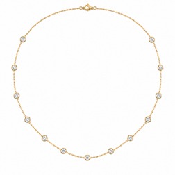 Five round brilliant lab-grown diamonds evenly spaced on a fine chain necklace